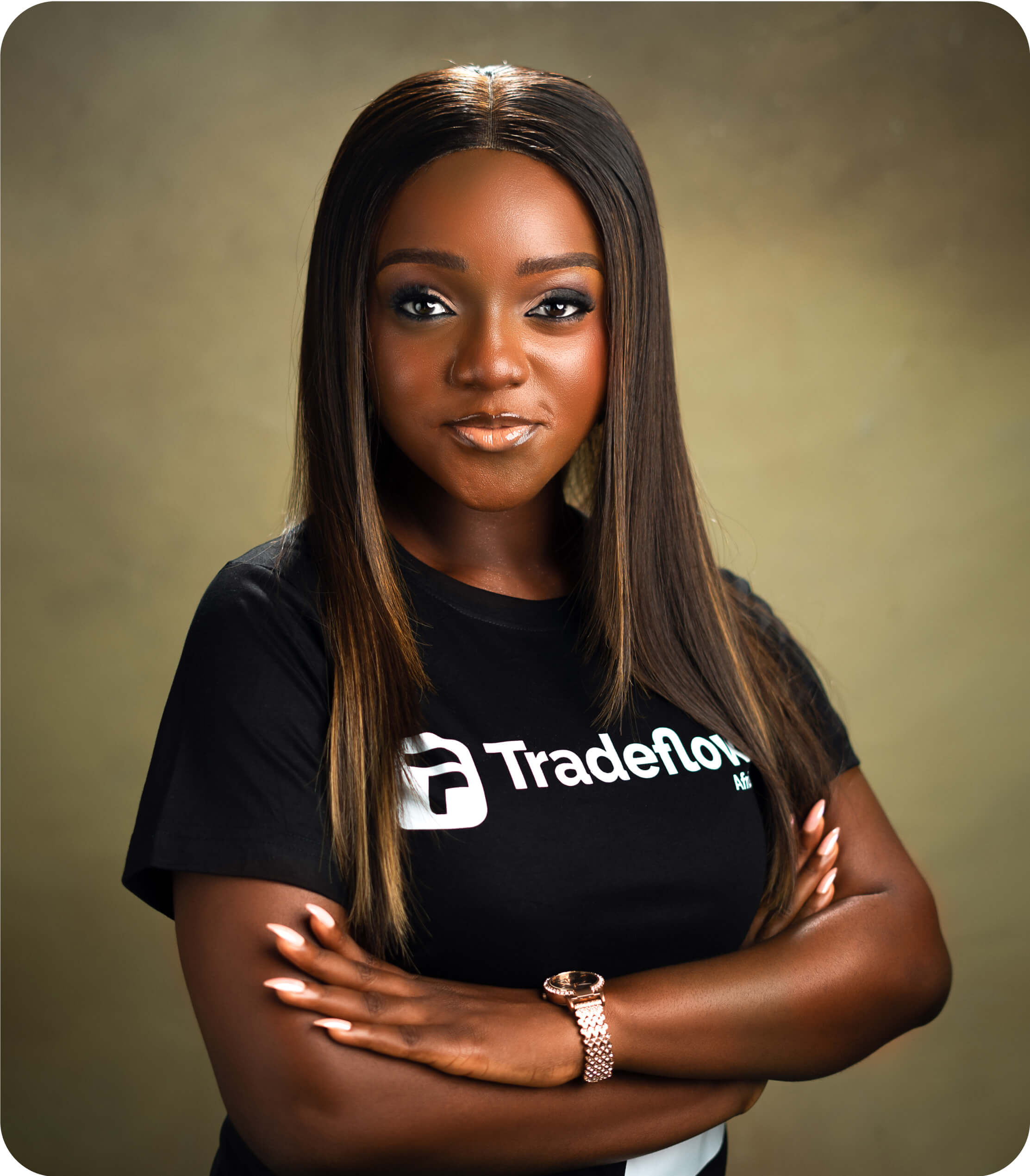 Ijidolapo S. Ijiwoye wearing a Tradeflow Africa shirt